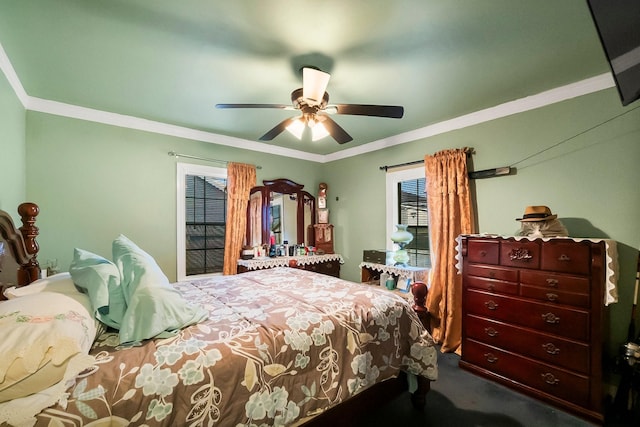 bedroom featuring ceiling fan, ornamental molding, and carpet floors