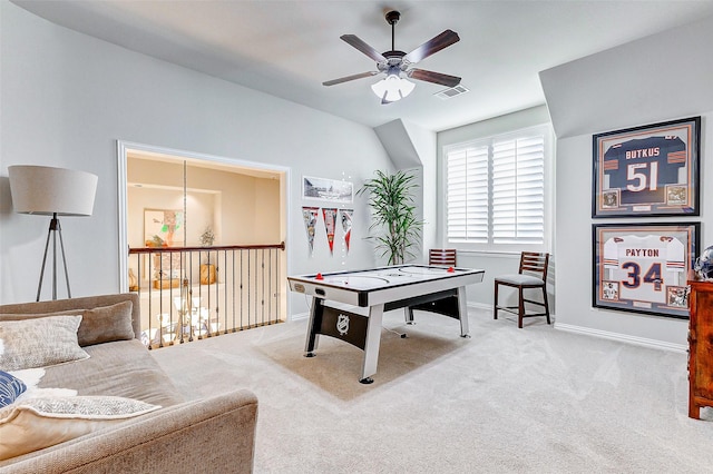 game room with light colored carpet and ceiling fan