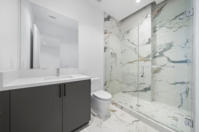 bathroom featuring vanity, toilet, and walk in shower