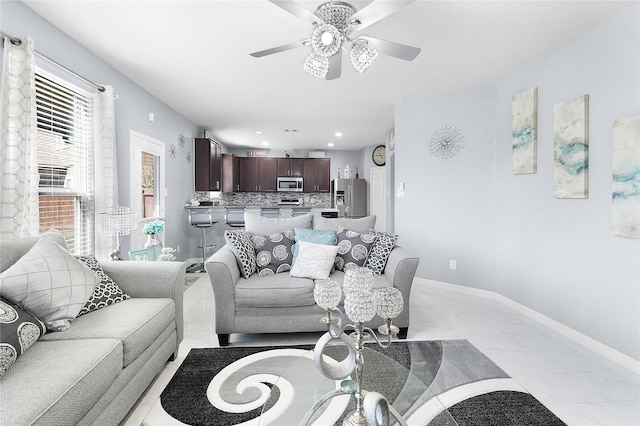 living room featuring ceiling fan