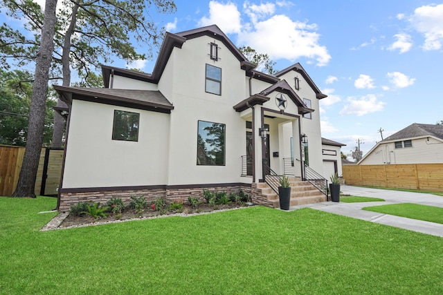 view of front facade with a front lawn