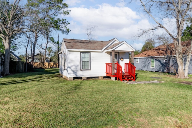 view of front of home with a front lawn