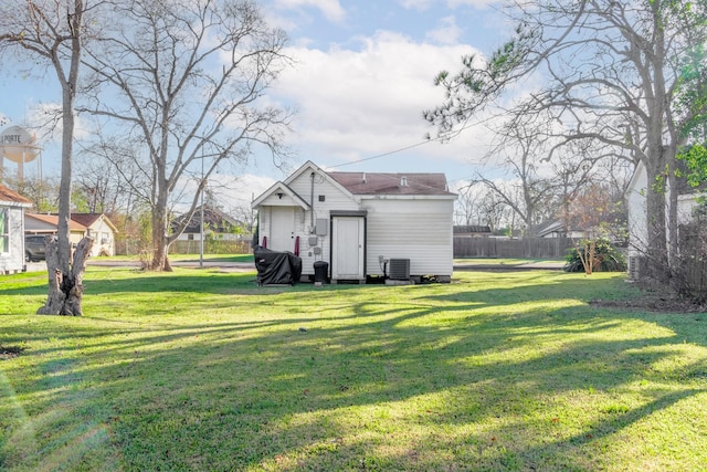 view of yard with central AC unit