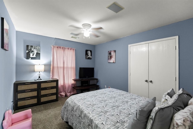 carpeted bedroom with a closet and ceiling fan