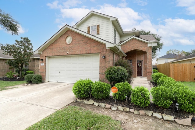 front of property with a garage