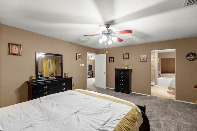 carpeted bedroom with ceiling fan and ensuite bathroom