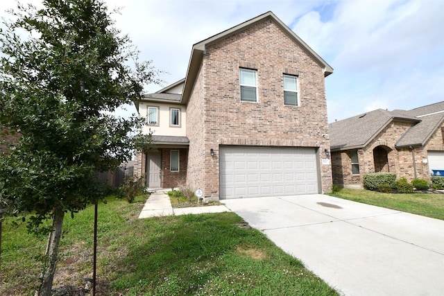 front of property featuring a garage and a front lawn