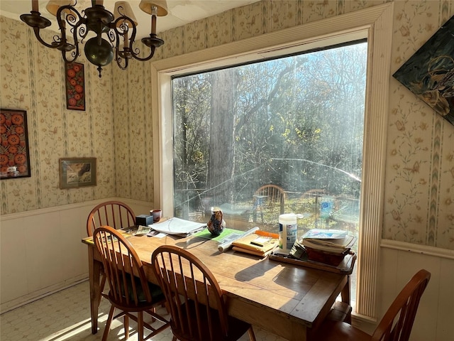 dining room featuring a notable chandelier and a wealth of natural light