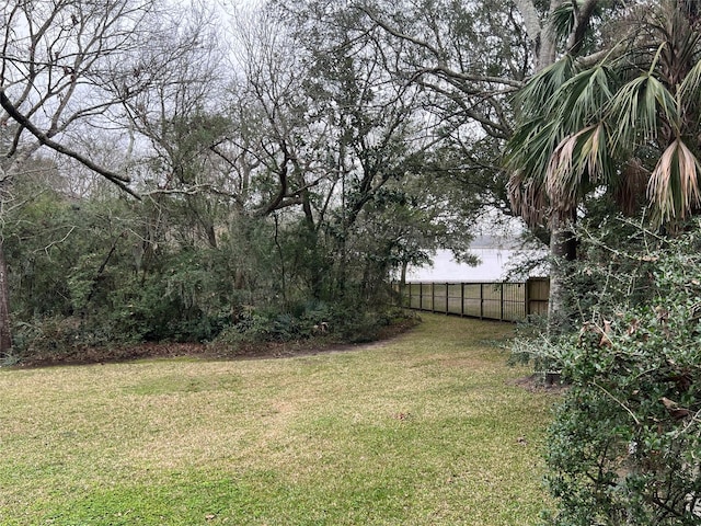 view of yard featuring fence