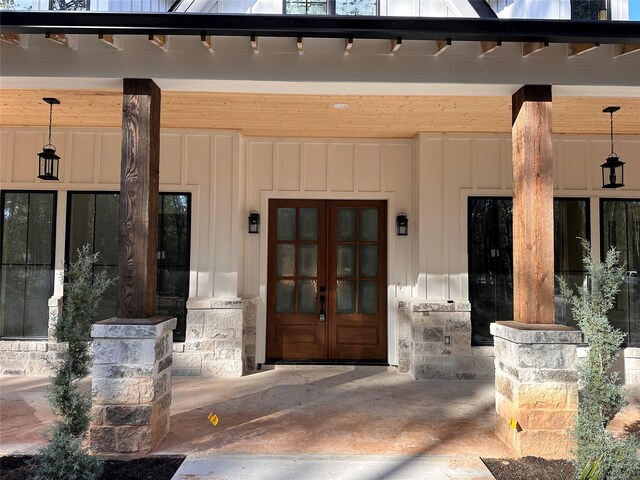 doorway to property featuring french doors