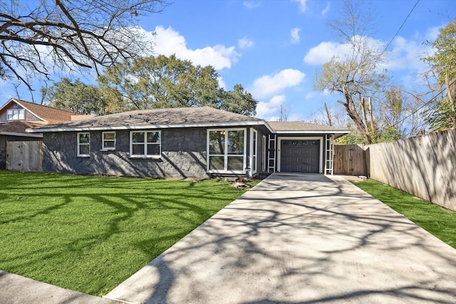 ranch-style house with a front yard and a garage