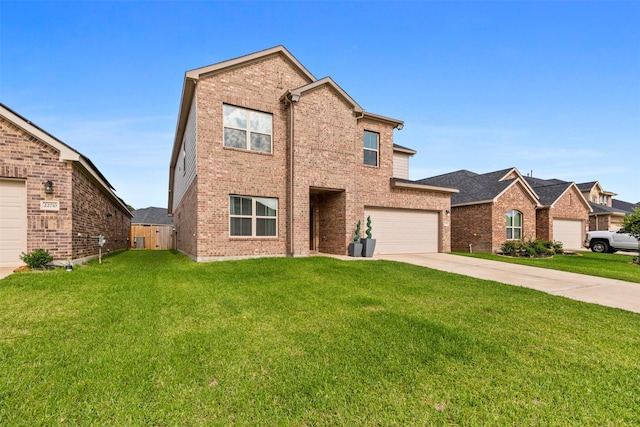 view of front property with a front lawn and a garage