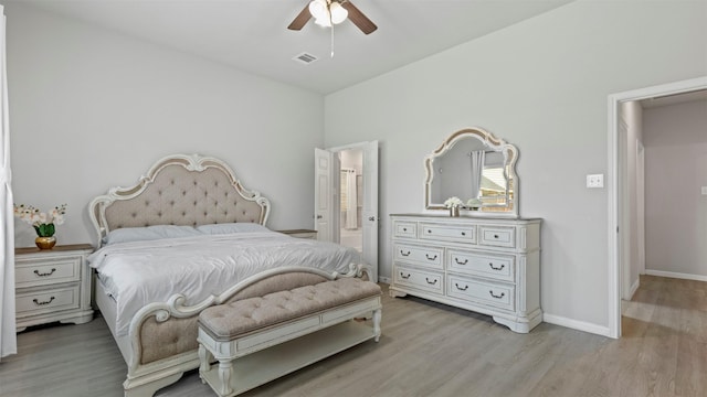 bedroom with ceiling fan and light wood-type flooring