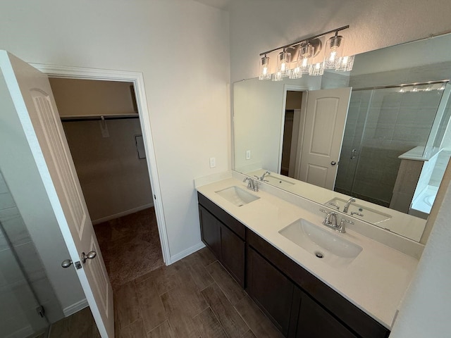 bathroom with vanity and an enclosed shower