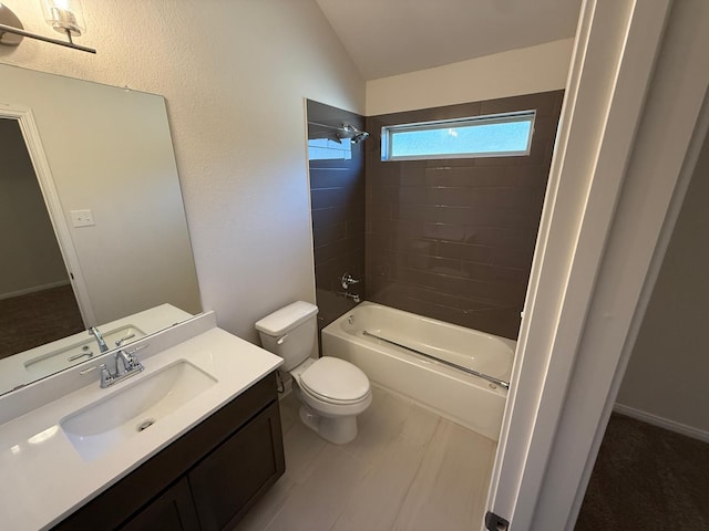 full bathroom with shower / washtub combination, vanity, vaulted ceiling, and toilet