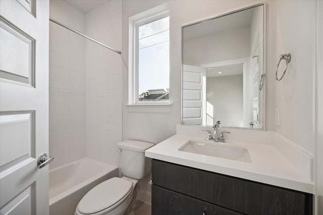 full bathroom featuring shower / tub combination, vanity, and toilet