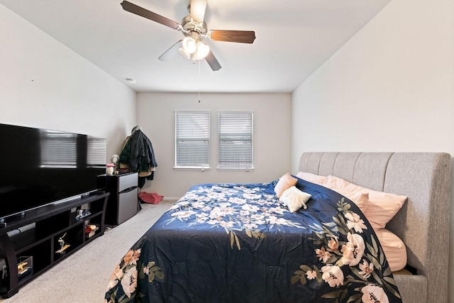 bedroom featuring ceiling fan and carpet floors