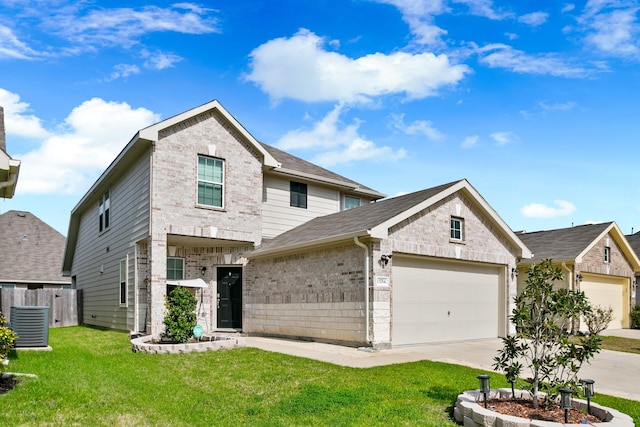 view of front of house featuring cooling unit, a garage, and a front yard