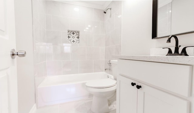 full bathroom with toilet, tiled shower / bath combo, and vanity