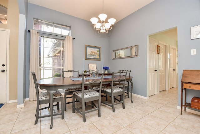 tiled dining area with a notable chandelier