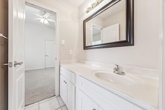 bathroom featuring ceiling fan, vanity, and tile patterned flooring