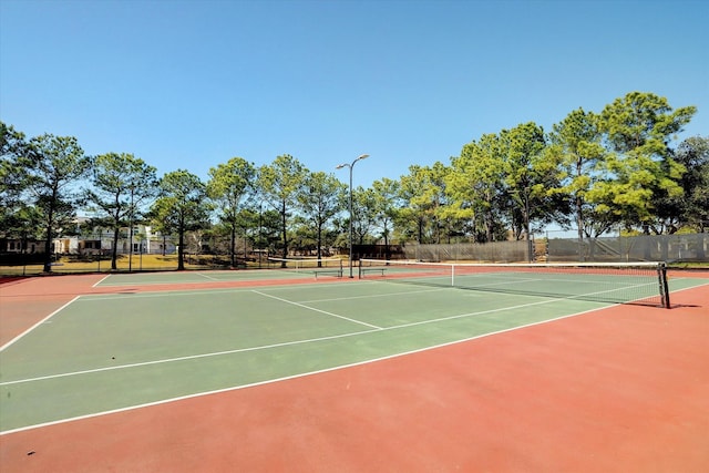 view of tennis court with basketball court