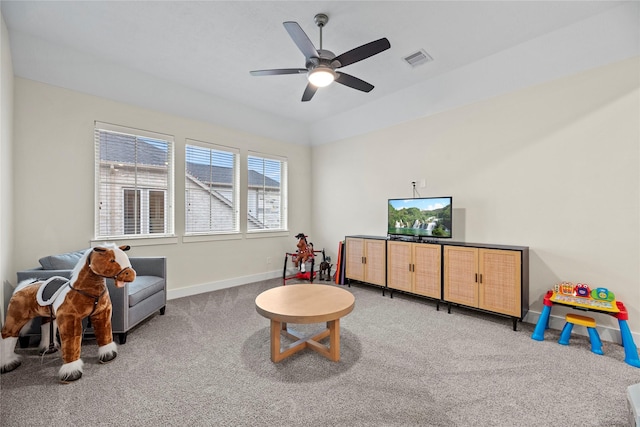 playroom with carpet flooring and ceiling fan