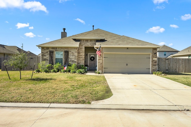 single story home featuring a garage and a front lawn