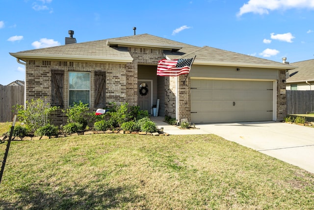 view of front facade featuring a garage and a front lawn