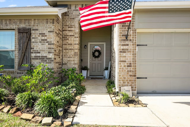 doorway to property featuring a garage