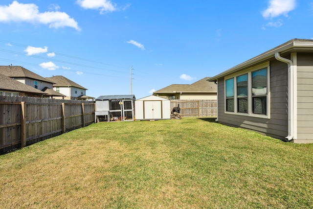 view of yard with a storage shed