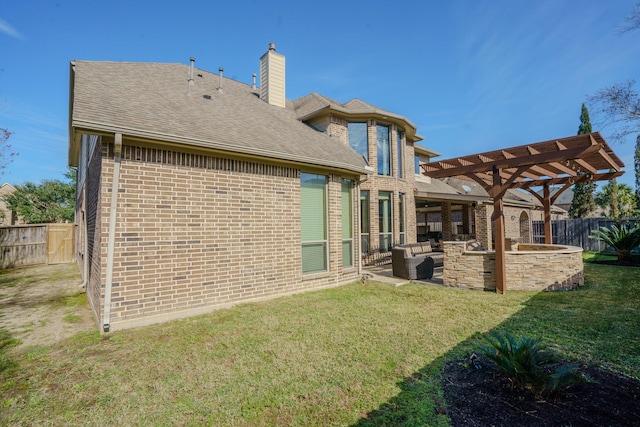 back of property featuring a lawn, a pergola, and an outdoor living space