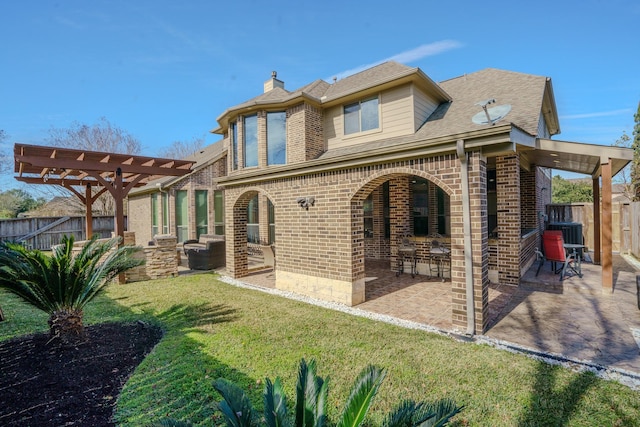 back of house featuring a patio, a lawn, central AC, and a pergola