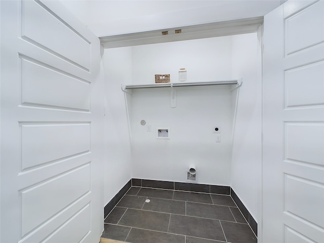 washroom featuring washer hookup, electric dryer hookup, hookup for a gas dryer, and dark tile patterned flooring