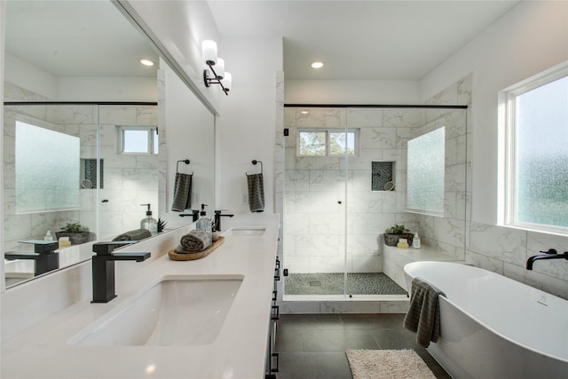 bathroom featuring separate shower and tub, plenty of natural light, tile walls, and tile patterned flooring