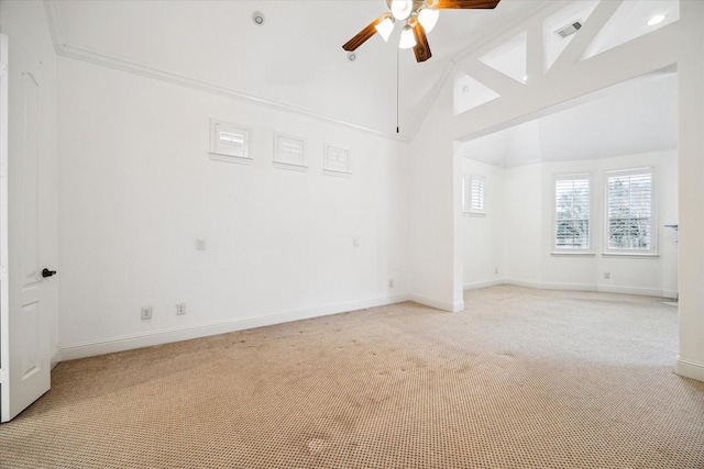 unfurnished room featuring ceiling fan, light carpet, and high vaulted ceiling