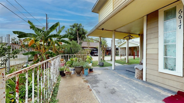 view of patio with ceiling fan