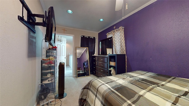 bedroom featuring ceiling fan and ornamental molding