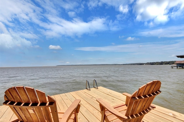 dock area featuring a water view