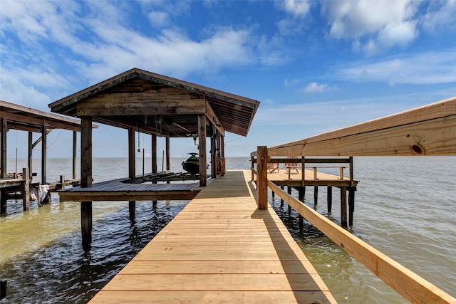 view of dock featuring a water view