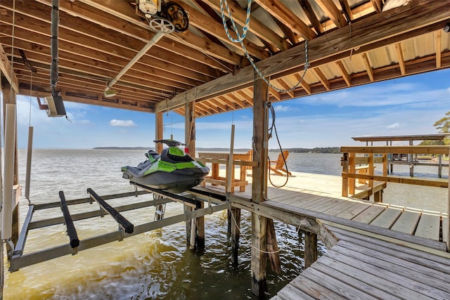 dock area featuring a water view