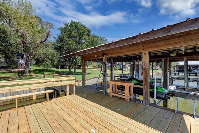 354 Edgewater Way, Point Blank, TX 77364 - dock with boat lift and a yard