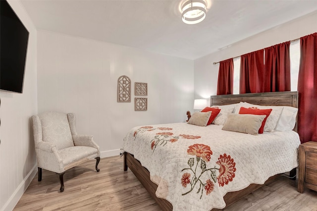354 Edgewater Way, Point Blank, TX 77364 - bedroom with wood finished floors and baseboards