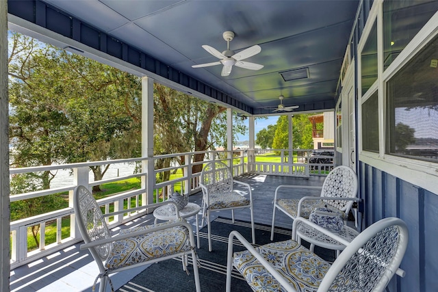 deck featuring ceiling fan and covered porch