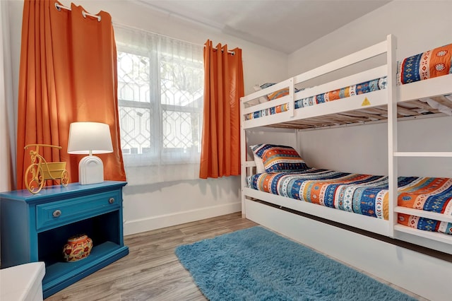 bedroom featuring hardwood / wood-style floors