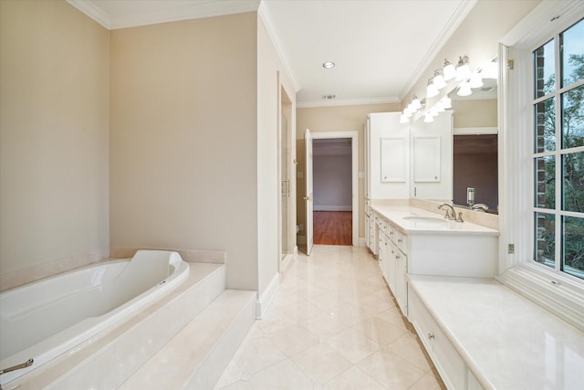 bathroom with vanity, tile patterned flooring, a washtub, and ornamental molding