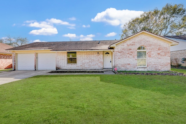 ranch-style home with a front yard and a garage