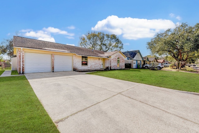 view of front facade featuring a garage and a front lawn