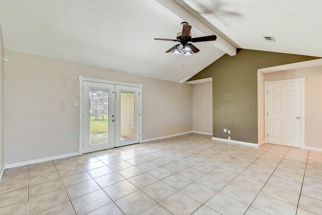 tiled spare room with vaulted ceiling with beams, ceiling fan, and a textured ceiling