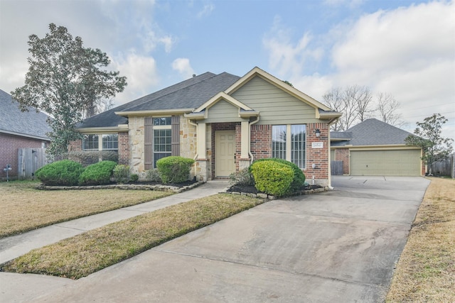 view of front facade featuring a garage and a front yard